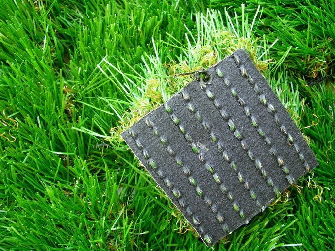 Cỏ Nhân Tạo Sợi Dài: Thể Thao Cường Độ Cao Như Đá Bóng