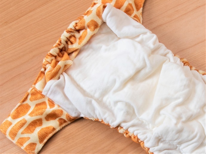Ưu Tiên Tã Làm Từ Chất Liệu Cotton, Muslin, Vải Sợi Tre. Đối Với Tã Vải Dạng Quần, Miếng Lót Nên Làm Bằng Chất Liệu Microfiber, Suede, v.v.